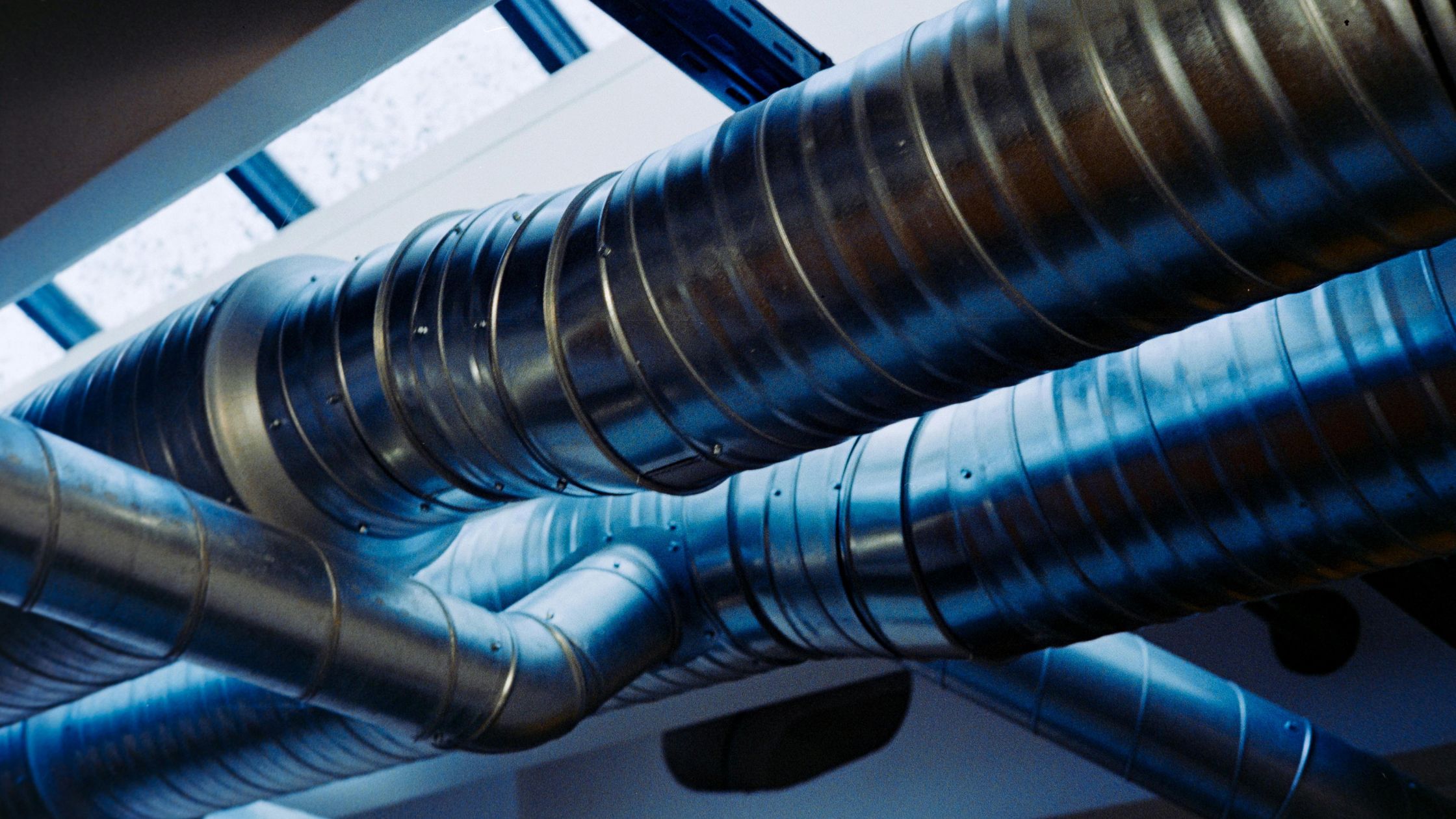 Radon mitigation system pipes venting radon safely outdoors