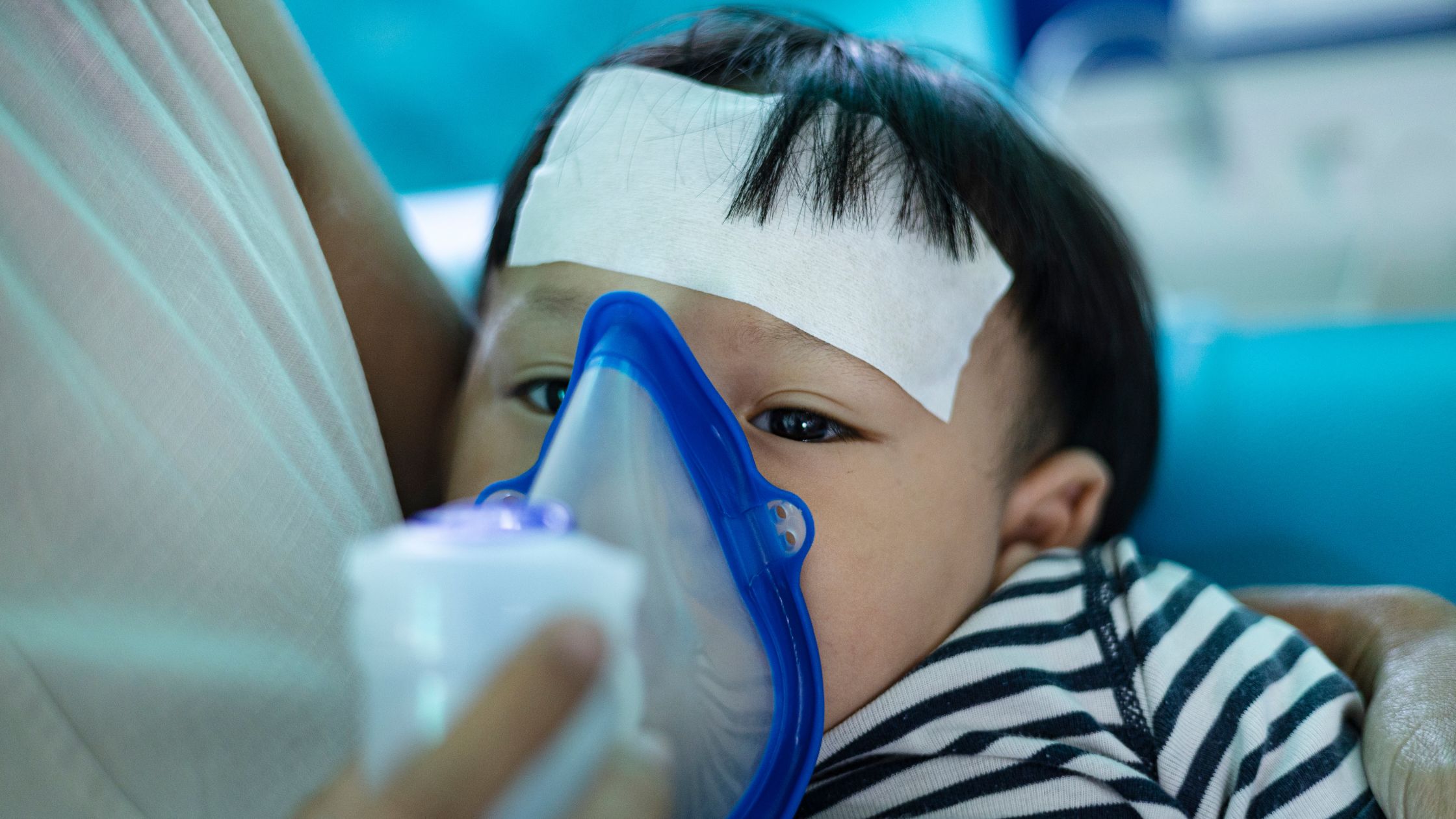 Person experiencing breathing discomfort linked to poor indoor air quality